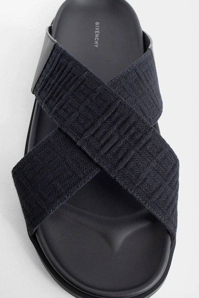 Shop Givenchy Man Black Slides