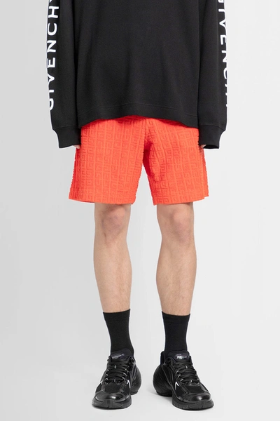 Shop Givenchy Man Orange Shorts