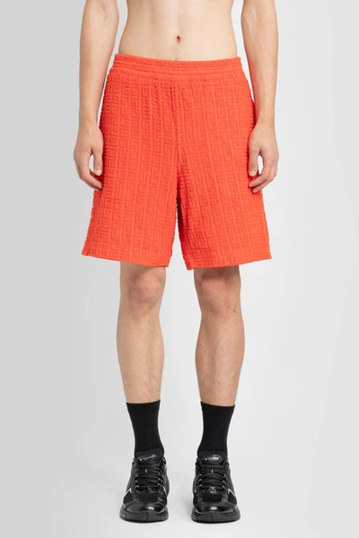 Shop Givenchy Man Orange Shorts