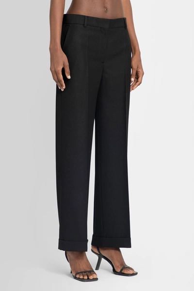 Shop Totême Woman Black Trousers