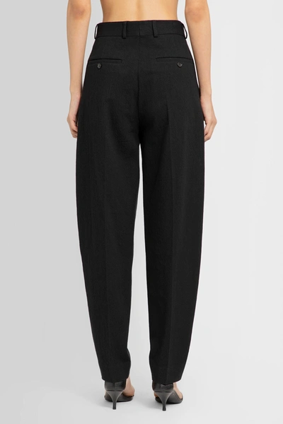 Shop Totême Woman Black Trousers