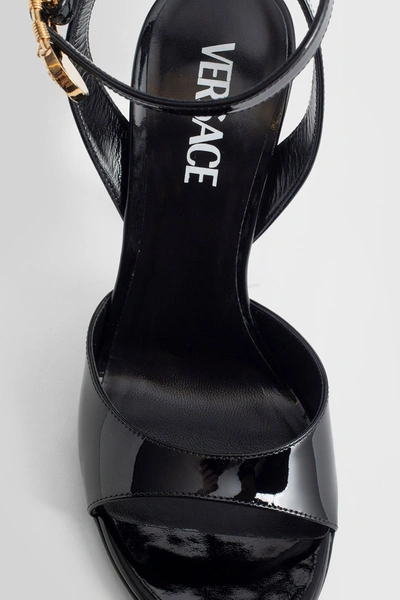Shop Versace Woman Black Sandals