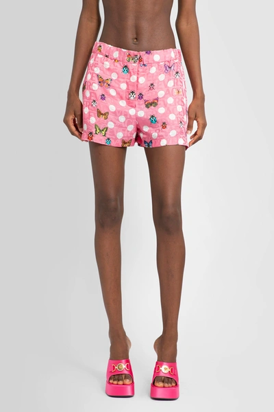 Shop Versace Woman Pink Shorts