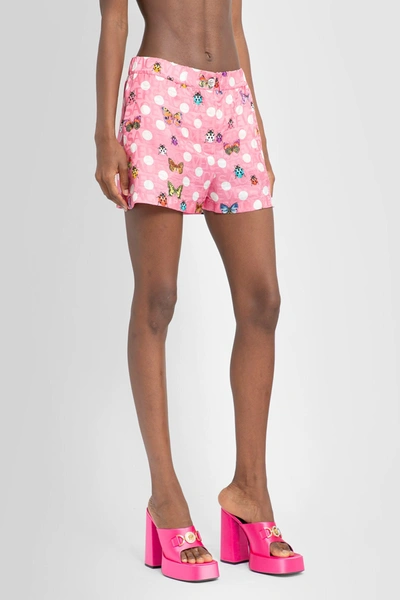 Shop Versace Woman Pink Shorts