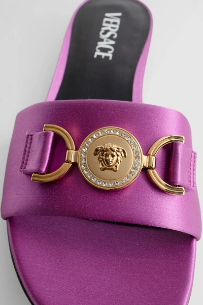 Shop Versace Woman Purple Slides
