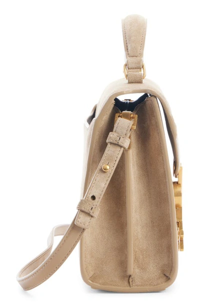 Shop Saint Laurent Mini Cassandra Leather Top Handle Bag In Matt Gold
