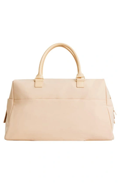 Shop Beis The Commuter Duffle In Beige