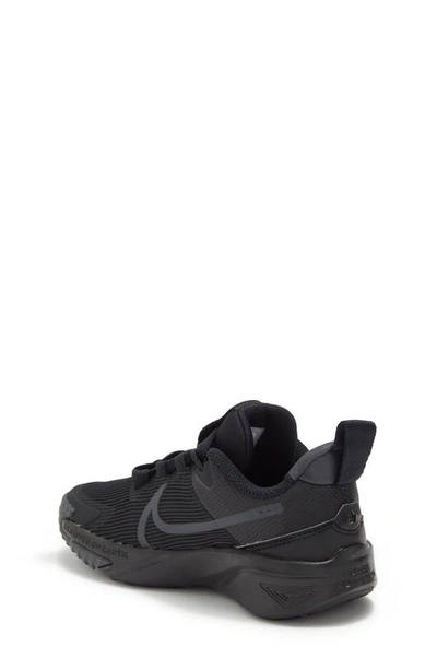 Shop Nike Kids' Star Runner 4 Sneaker In Black/ Black/ Anthracite