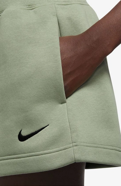 Shop Nike Phoenix Fleece Knit Shorts In Oil Green/ Black