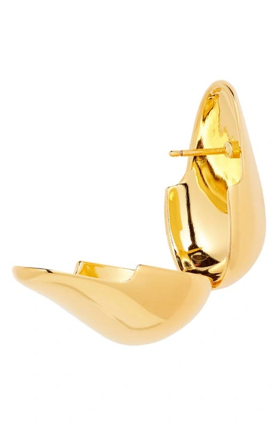 Shop Zimmermann Luminosity Medium Pebble Huggie Earrings In Gold