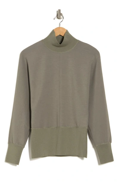 Shop Theory Mixed Media Turtleneck Top In Pale Green/ Army