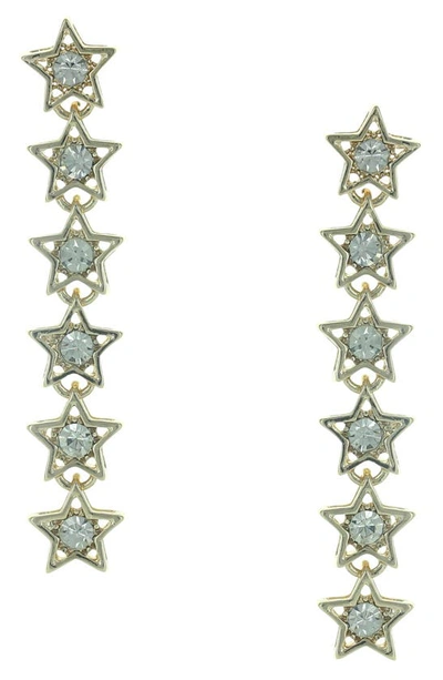 Shop Olivia Welles Kris Stacked Stars Linear Drop Earrings In Metallic