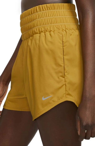 Shop Nike Dri-fit Ultrahigh Waist 3-inch Brief Lined Shorts In Bronzine/ Reflective Silver