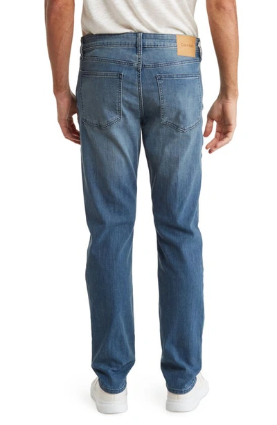 Shop Calvin Klein Slim Jeans In Chipped Blue