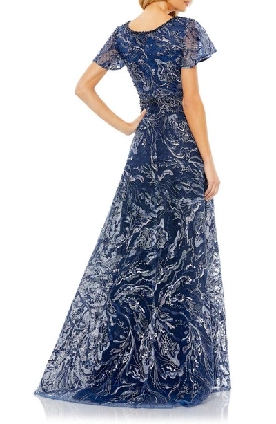 Shop Mac Duggal Embroidered Embellished Flutter Sleeve Gown In Navy