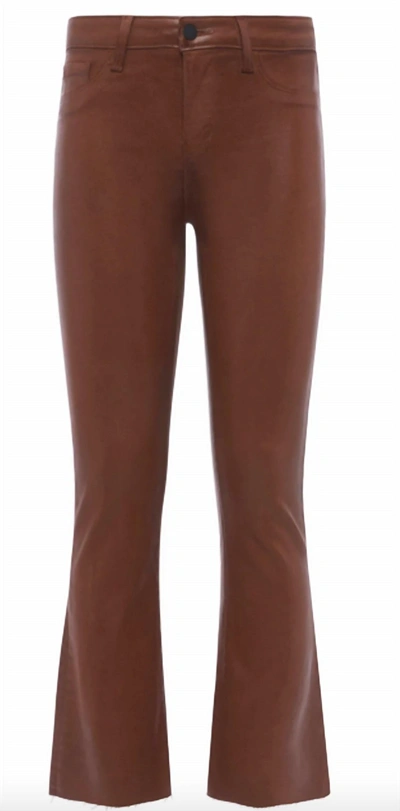 Shop L Agence Kendra Crop Flare Jean In Nubuck Coated In Brown