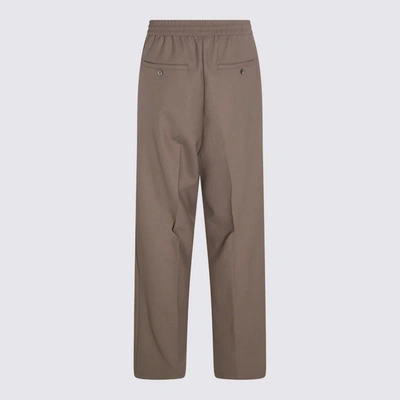 Shop Ami Alexandre Mattiussi Ami Paris Trousers Beige