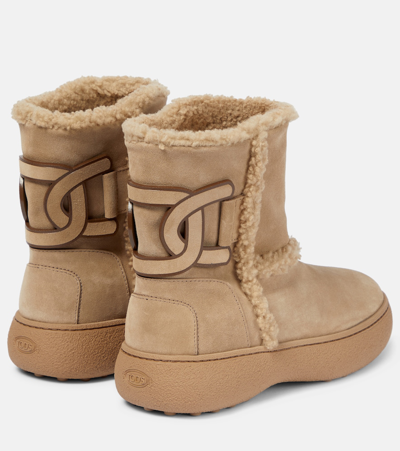 Shop Tod's Suede And Shearling Ankle Boots In Beige