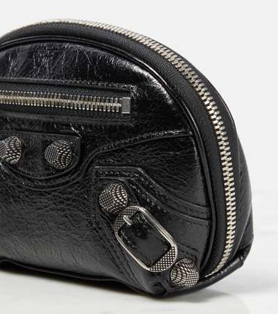 Shop Balenciaga Le Cagole Mini Leather Pouch In Black