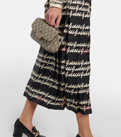 Shop Gucci Printed Pleated Silk Midi Skirt In Black