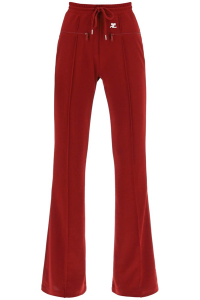 Shop Courrèges Interlock Drawstring Bootcut Pants In Red