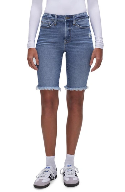 Shop Good American Good Legs Distressed Cutoff Bermuda Shorts In Indigo468