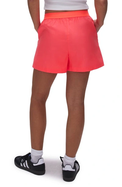 Shop Good American Coated Cotton Poplin Shorts In Fiery Coral 002