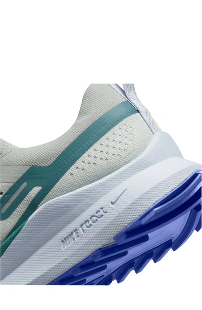 Shop Nike React Pegasus Trail 4 Running Shoe In Light Silver/ Teal/ Blue