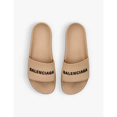 Shop Balenciaga Logo-embossed Rubber Slides In Beige Comb