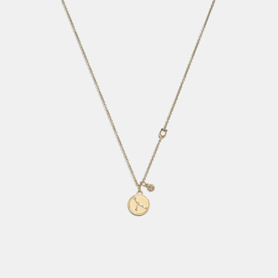 Shop Coach Outlet Cancer Coin Pendant Necklace In Yellow
