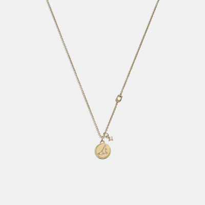 Coach Outlet Capricorn Coin Pendant Necklace In Yellow