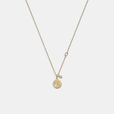 Shop Coach Outlet Sagittarius Coin Pendant Necklace In Yellow