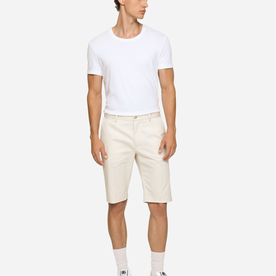 Shop Dolce & Gabbana Stretch Cotton Shorts With Dg Patch In Beige