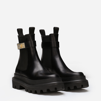 Dolce & Gabbana Calf Leather Ankle Boots With Logo Buckle In Black