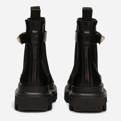 Dolce & Gabbana Calf Leather Ankle Boots With Logo Buckle In Black