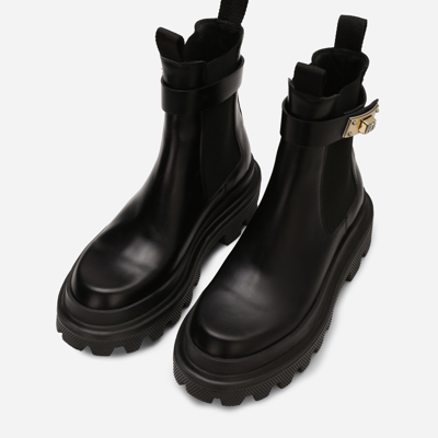 Dolce & Gabbana Calf Leather Ankle Boots With Logo Buckle In Black