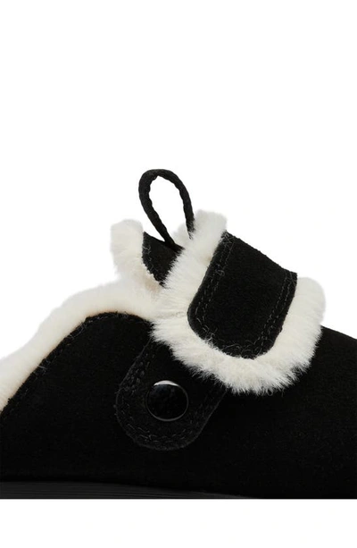 Shop Sorel Viibe Faux Fur Clog In Black/ Natural