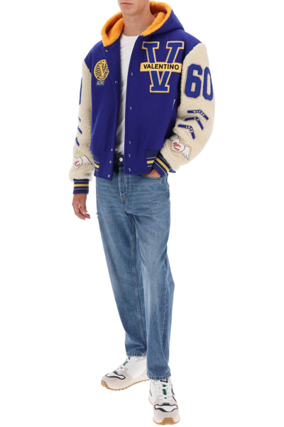 Shop Valentino Varsity Bomber Jacket With Shearling Sleeves In Blue,white
