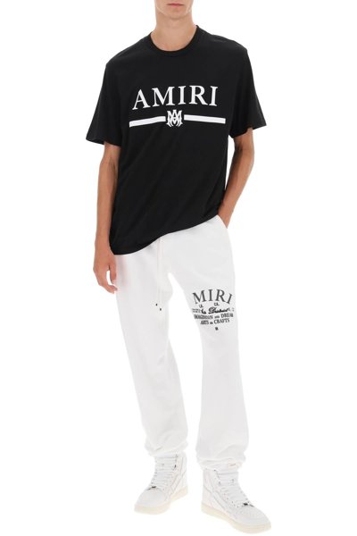 Shop Amiri Arts District Joggers In White