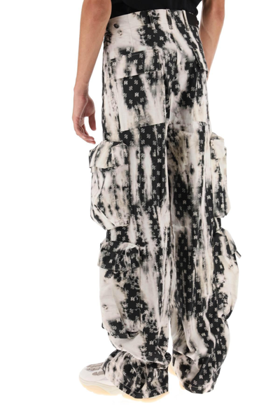 Shop Amiri Bleached Cargo Pants With Monogram Motif In Black,white
