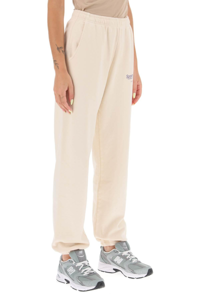 Shop Sporty And Rich 'running And Health Club' Sweatpants In Beige