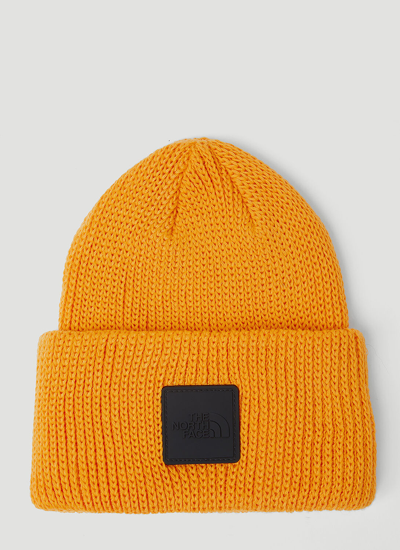 Shop The North Face Logo Patch Beanie Hat In Orange