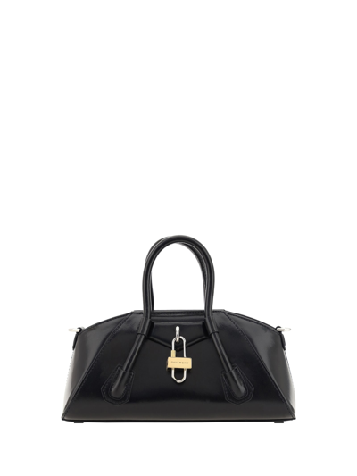 Shop Givenchy Stretch Mini Handbag In Black