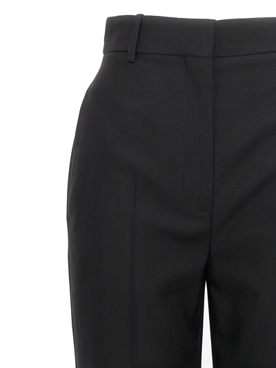 Shop Alexander Mcqueen Wool Tailored Pants In Black