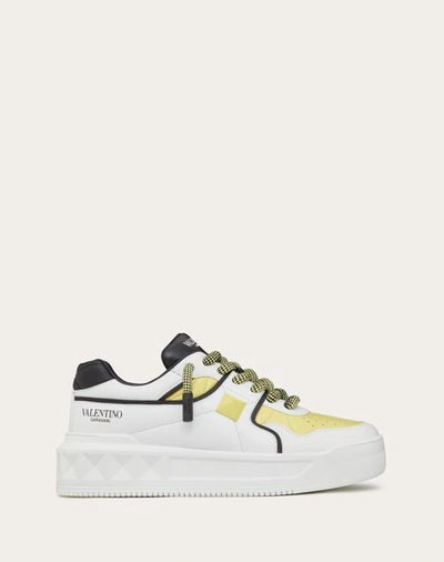 Shop Valentino Garavani One Stud Xl Nappa Leather Low-top Sneaker In White/black/light Yellow
