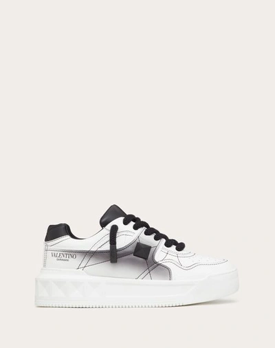 Shop Valentino Garavani One Stud Xl Nappa Leather Low-top Sneaker In White/ Black