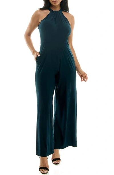 Shop Nina Leonard Twist Halter Knit Jumpsuit In Emerald