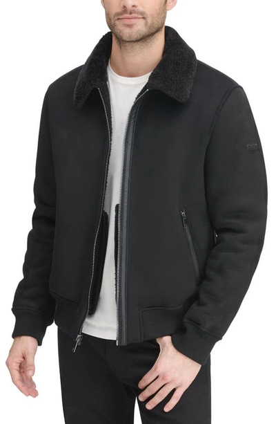 Shop Dkny Faux Shearling Lined Bomber Jacket In Black