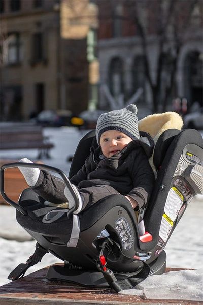 Shop Natural Cozy Baby Lambskin Car Seat Traveler In Cornsilk Cream