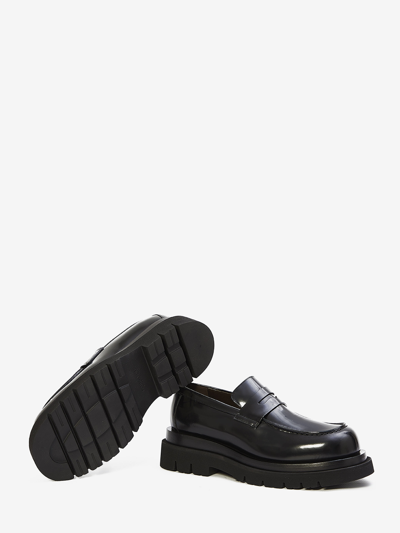 Shop Bottega Veneta Lug Flat Loafers In Black